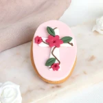 Ciastko lukrowane Owal Krzyżyk z kwiatami