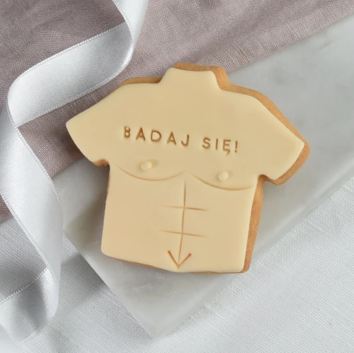 Ciasteczko w kształcie męskiego torsu.