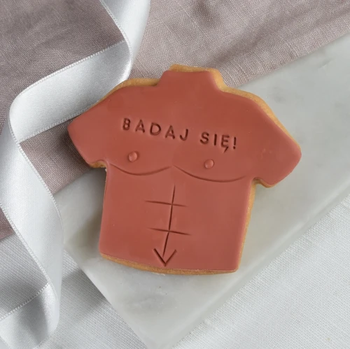 Ciasteczko w kształcie męskiej klaty.