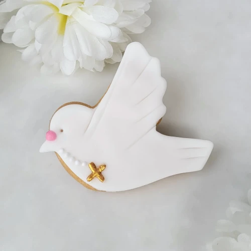 Ciasteczko w kształcie gołąbka z różańcem