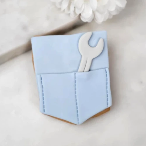 Ciasteczko w kształcie kieszeni budowlańca